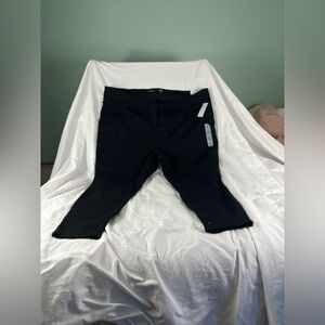 Sleek Black Slim-Fit Jeans size Woman’s 30 plus. Length 27. Rockstar super jean